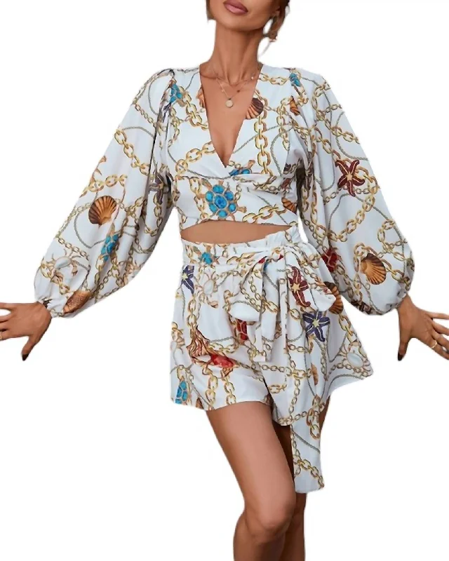 Vaila Floral V-Neck Romper In White Floral